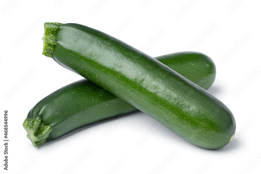 Pair of fresh green whole zucchini isolated on white background Pair of fresh green whole zucchini isolated on white background