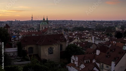 Wallpaper Mural Sunrise timelapse over the roofs of Mala Strana in Prague, Czech Republic as seen from Hradcany near Prague Castle as the sun slowly illuminates the famous red roofs Torontodigital.ca