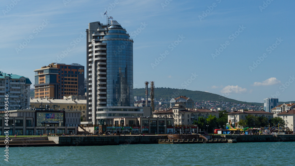 View of Novorossiysk Embankment of Admiral Serebryakov from side of Western mole. Novorossiysk, Russia - September 15, 2021