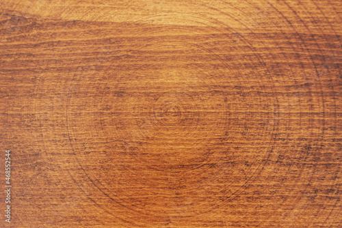 Brown varnished and stripped natural wood with grains for background and texture.