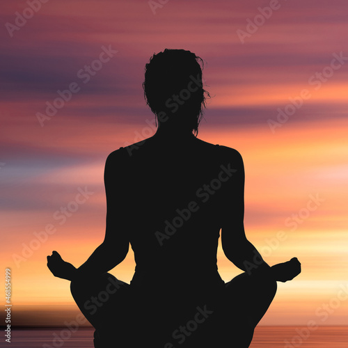 Meditation Silhouette with sunset background