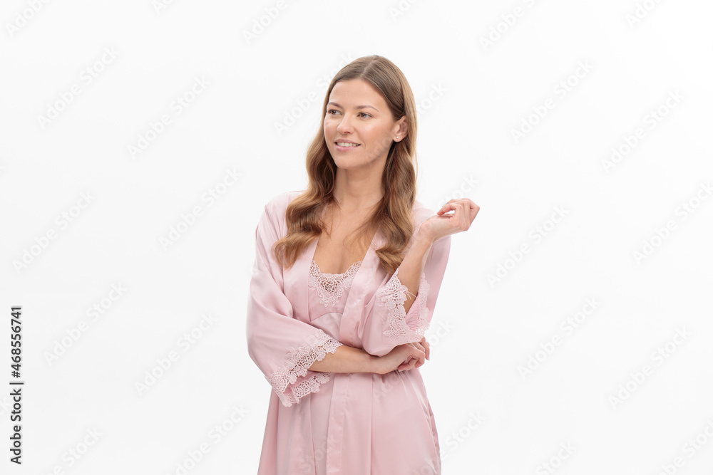 Pretty young woman in beautiful light silk robe on white background Pretty young woman in beautiful light silk robe on white background