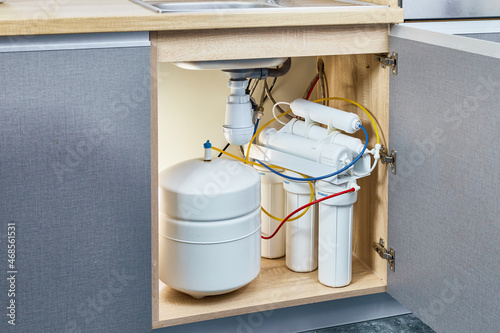 Purification osmosis system and water filter at home kitchen.