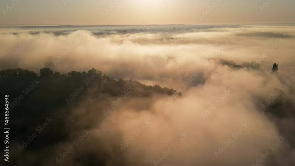 Aerial drone view of nature of Moldova at sunset. River and lush fog above it, greenery Aerial drone view of nature of Moldova at sunset. River and lush fog above it, greenery