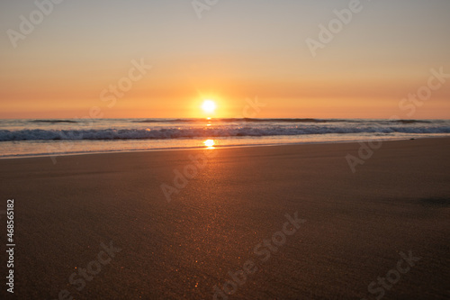 Beautiful orange Sunset at the Beach in El Palmar Andalucia Spain at the Costa de la Luz © Stefan
