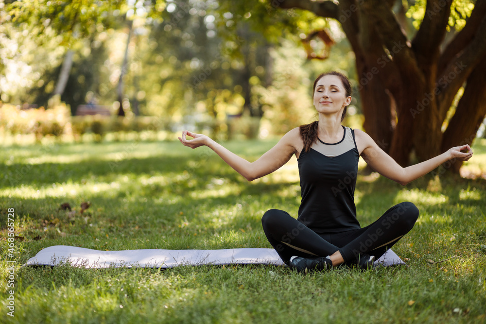 Sporty fit slim woman instructor training hatha yoga , relax breathe. Sporty fit slim woman instructor training hatha yoga , relax breathe.