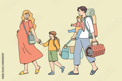 Young family with kids carry personal belongings ready for summer vacation. Happy father, pregnant mother and children ready for travel. Season holiday, tourism concept. Leisure activity.