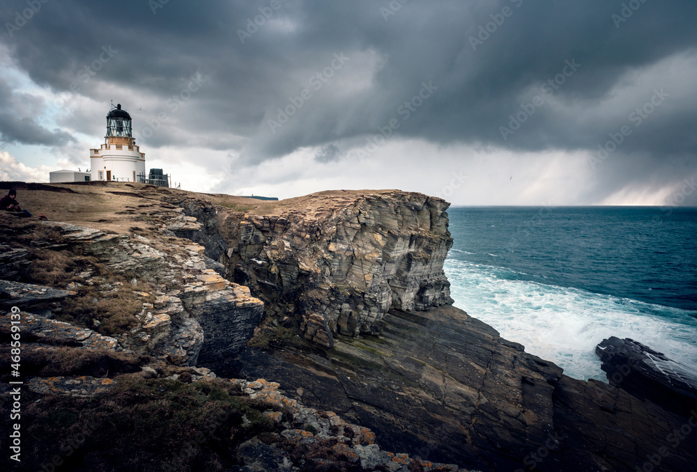 Lighthouse on a headland in Orkney 