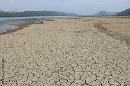Dry and cracked land, dry due to lack of rain. Effects of climate change such as desertification and droughts. 