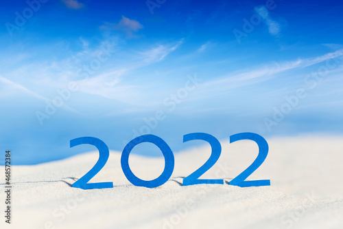 Wallpaper Mural tropical beach and 2022 happy new year. Season vacation, holiday concept Torontodigital.ca