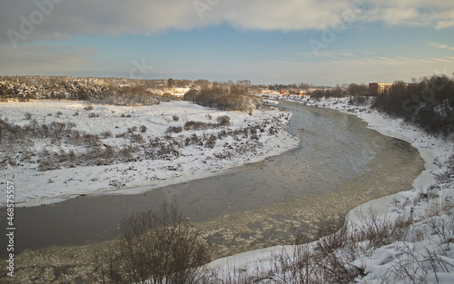 Beautiful river Venta bend on a sunny winter day. Kuldiga, Latvia. © Bargais