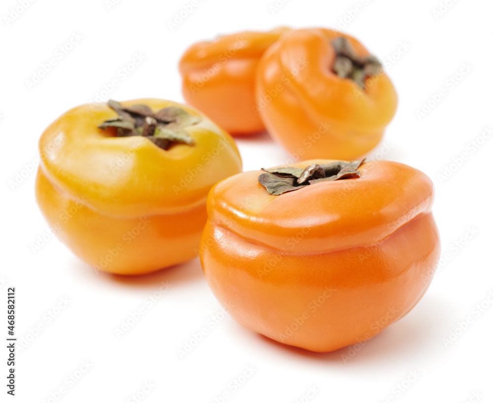 persimmon on a white background persimmon on a white background