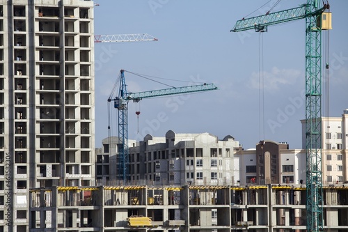 Lots of tower Construction site with cranes and building with blue sky background