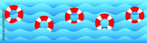 Sea waves and color lifebuoys