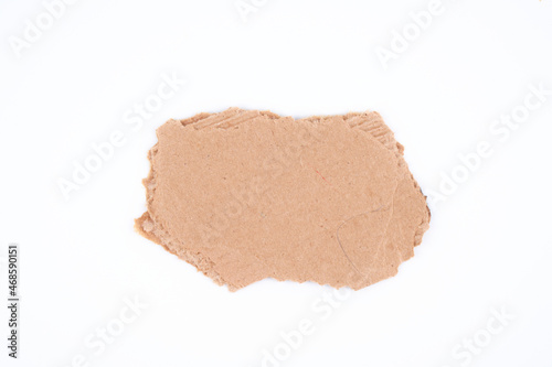 Piece of brown cardboard with blank place for text or picture isolated on white background, clipping path