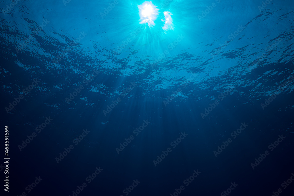 Sun with rays look from underwater Sun with rays look from underwater