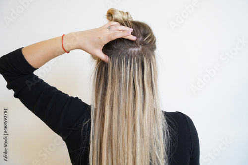 Canvas Print Natural Hair extensions blonde woman on a white background