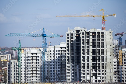 The architectural complex of residential buildings on sky background