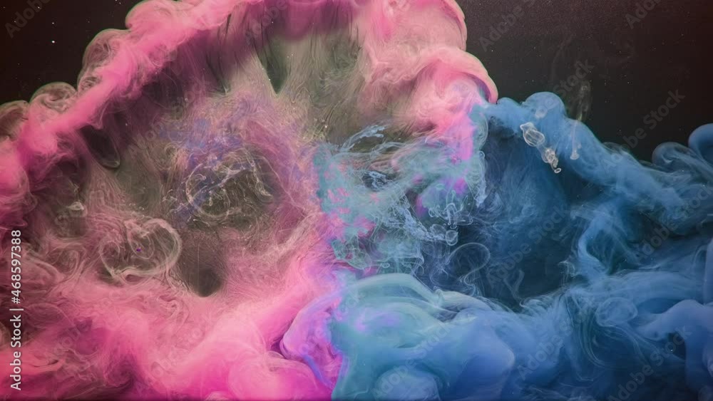 Ink water splash. Logo opener. Color steam explosion. Dye mix. Pink blue smoke cloud animation on dark glitter dust particles abstract background layer for intro.