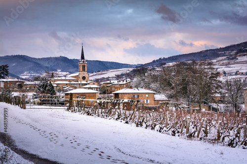 Village of Denice and landscape of Beaujolais under the snow