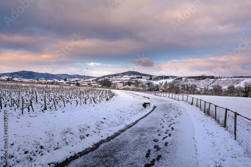 Village of Denice and landscape of Beaujolais under the snow