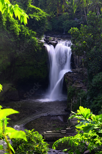 Tegenungan Waterfall in jungle Ubud, Bali island Indonesia. Wallpaper background. Natural scenery.