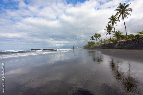 Fototapeta Naklejka Na Ścianę i Meble -  Colorful ocean beach. Beautiful beach scenery with calm waves and soft sandy beach and palm. Empty tropical landscape, horizon with scenic coast view. Bali island Indonesia.