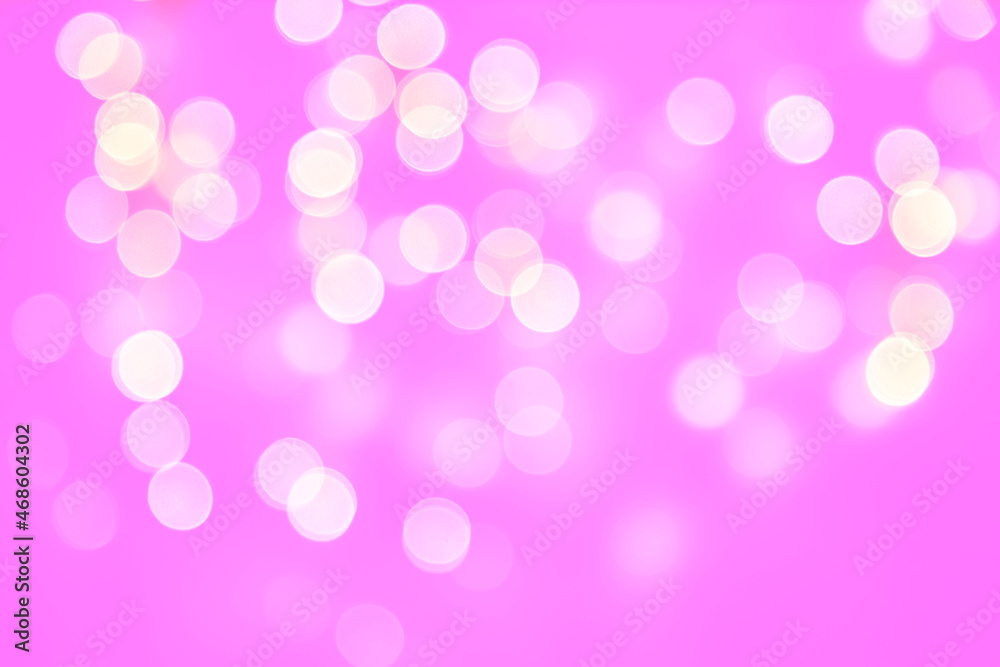 Glowing garland bokeh in pink. Christmas background Glowing garland bokeh in pink. Christmas background