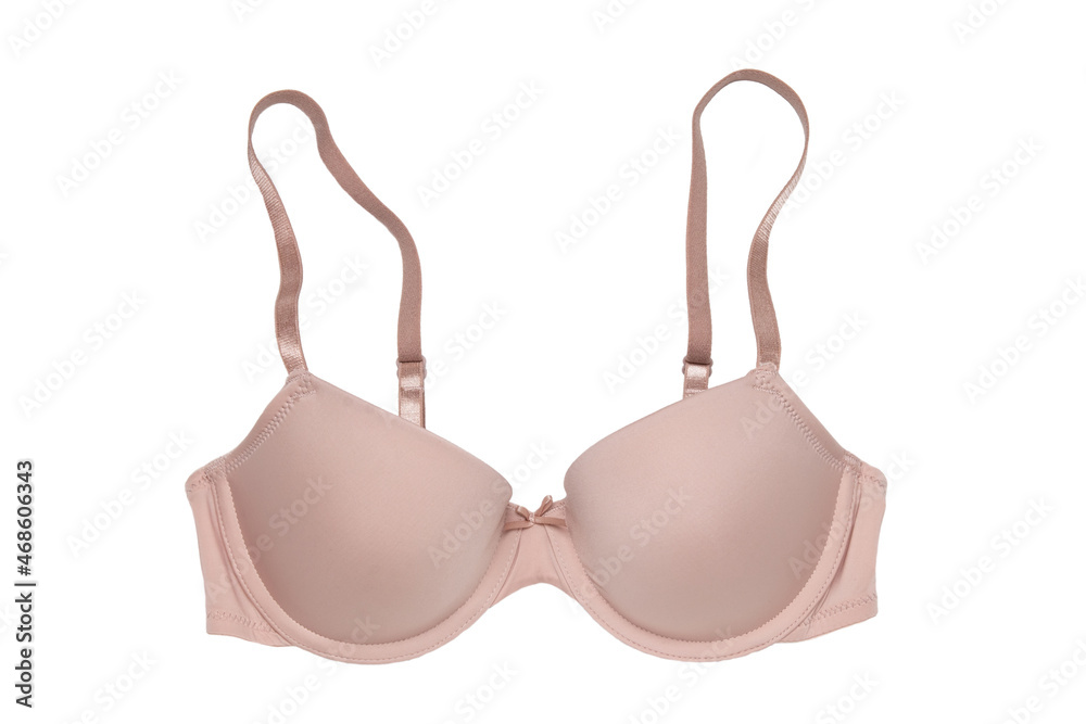 Bra isolated. Closeup of beautiful female stylish flesh colored brassiere with straps isolated on a white background. Fashionable sexy women underwear. Bra isolated. Closeup of beautiful female stylish flesh colored brassiere with straps isolated on a white background. Fashionable sexy women underwear.