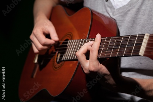 Man Playing Acoustic Guitar, Close-up, Isolated