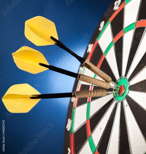 Closeup of Darts in Bullseye