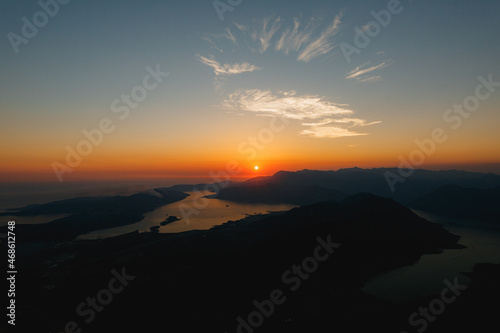 Rays of the setting sun over the horizon. View from Mount Lovcen