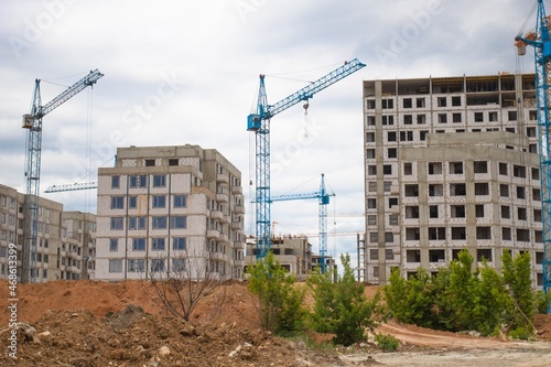 The architectural complex of residential buildings on sky background