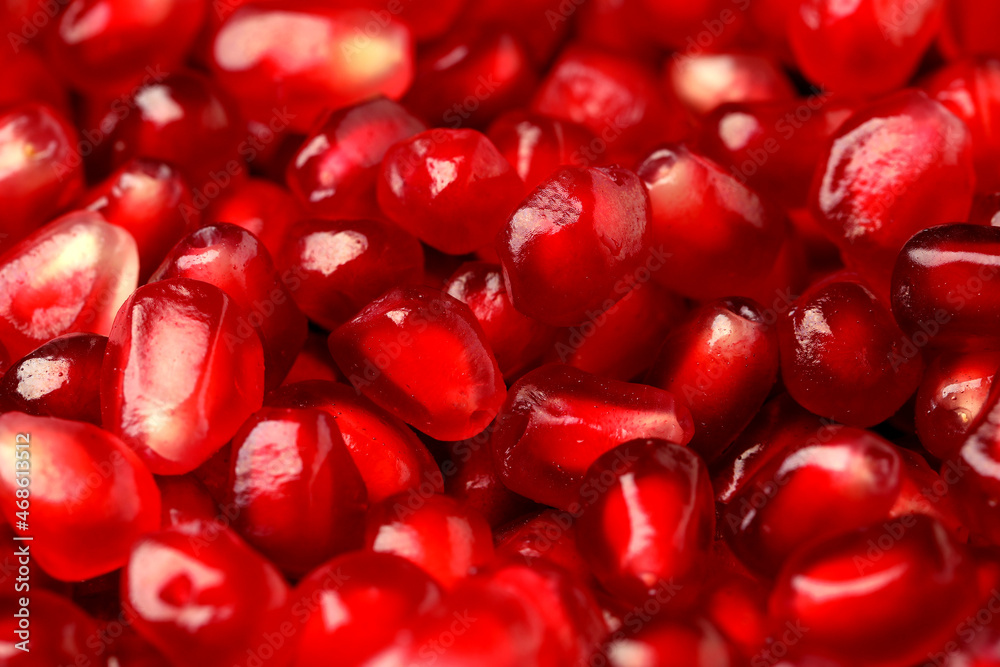 Many tasty pomegranate seeds as background, closeup Many tasty pomegranate seeds as background, closeup