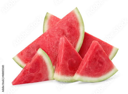 Slices of delicious ripe seedless watermelon on white background photo