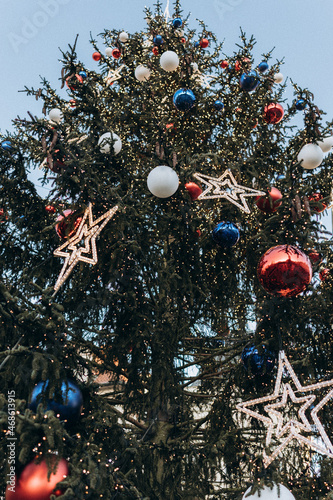 Decorated Christmas tree close-up.vertical Christmas background.