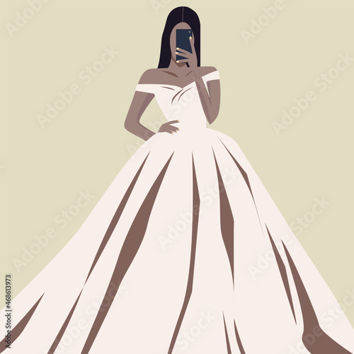 the bride takes a selfie in a wedding dress