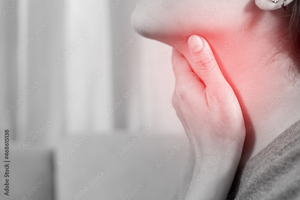 Through Pain sore throat pain. Closeup of young woman sick holding her inflamed ...