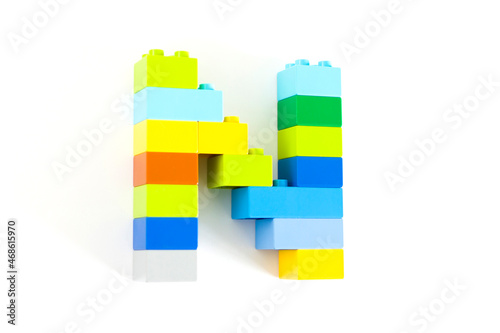 Colorful toy brick letter N