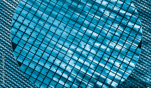 silicon chip wafer reflecting blue colors background