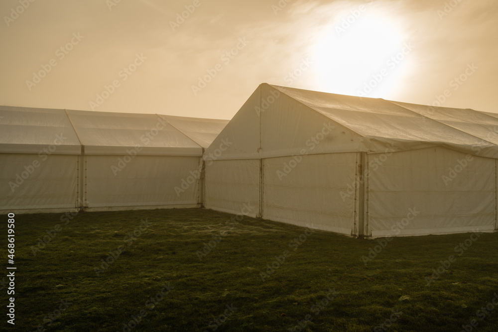 Marquee in the morning mist at Petworth park, West Sussex Marquee in the morning mist at Petworth park, West Sussex