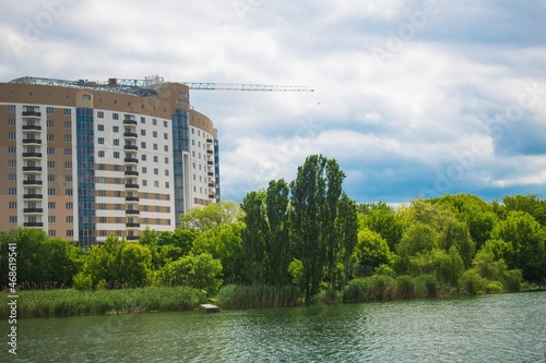 The architectural complex of residential buildings on sky background