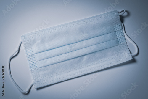 Blue medical mask on a white background