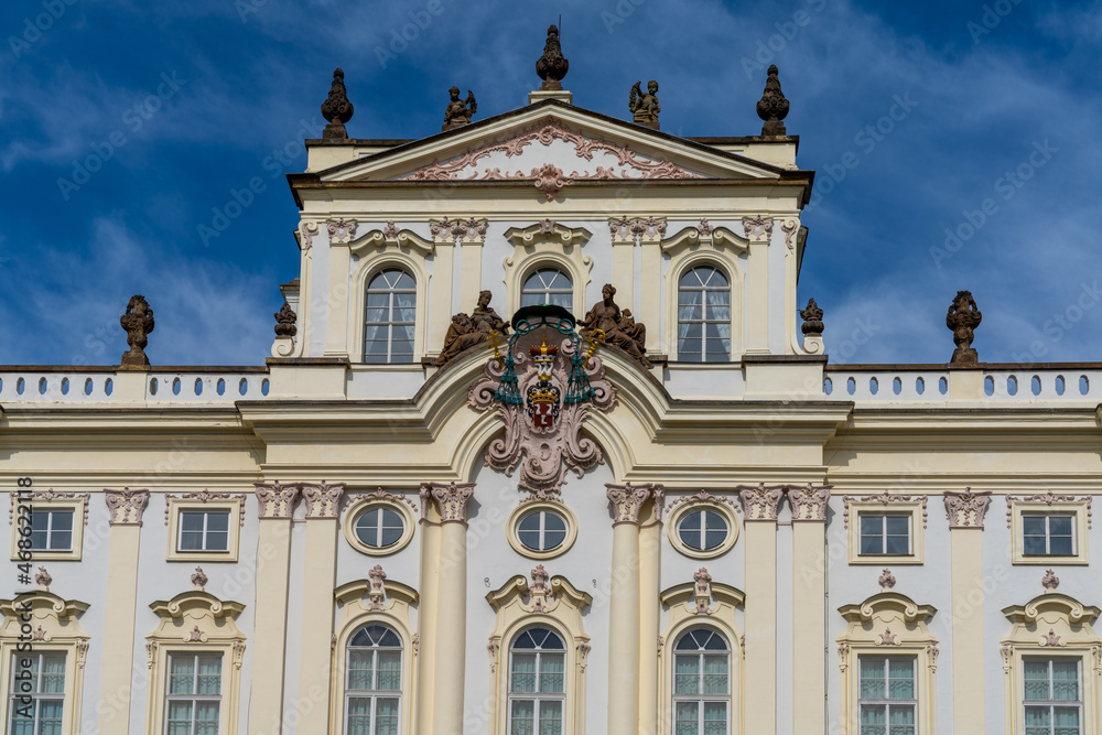 detail view of the facade of the Palace of the Archbishop in the city center of Prague