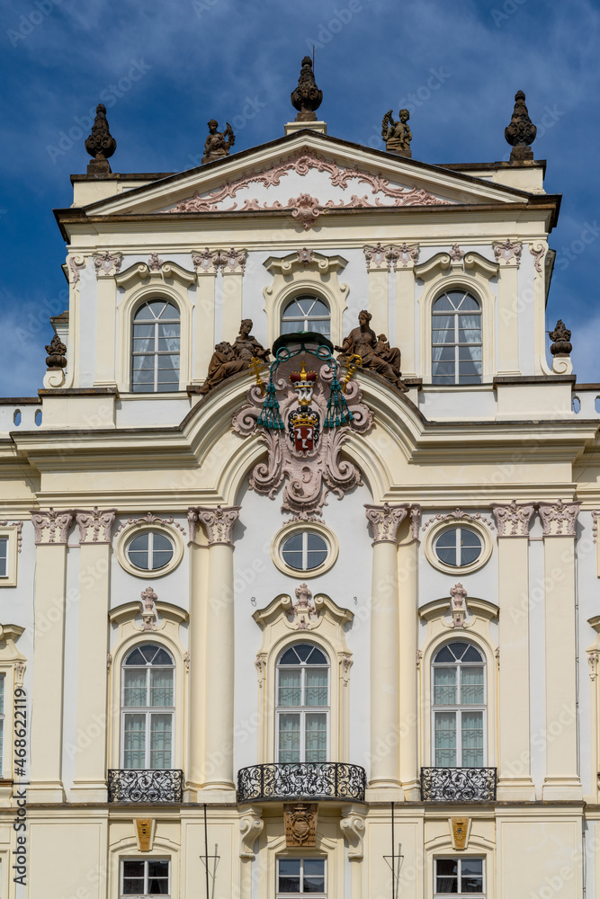 detail view of the facade of the Palace of the Archbishop in the city center of Prague
