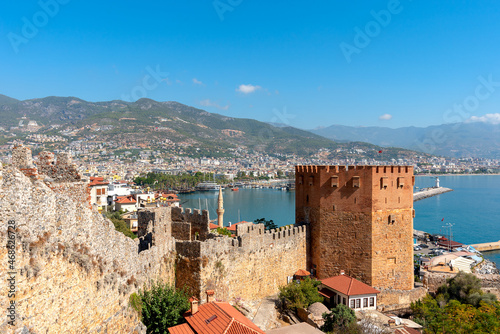 View of the resort town of Alanya, the Red Tower on the shores of the Mediterranean Sea.