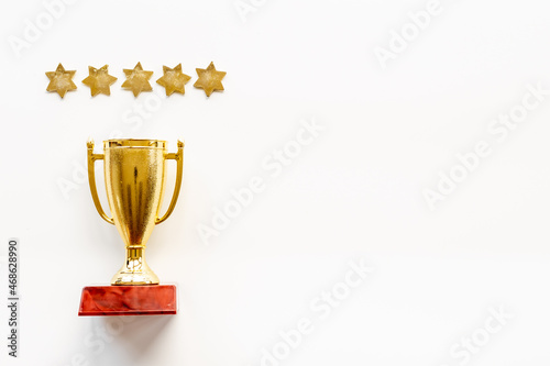 Five stars rating and winner trophy cup. Award and success concept