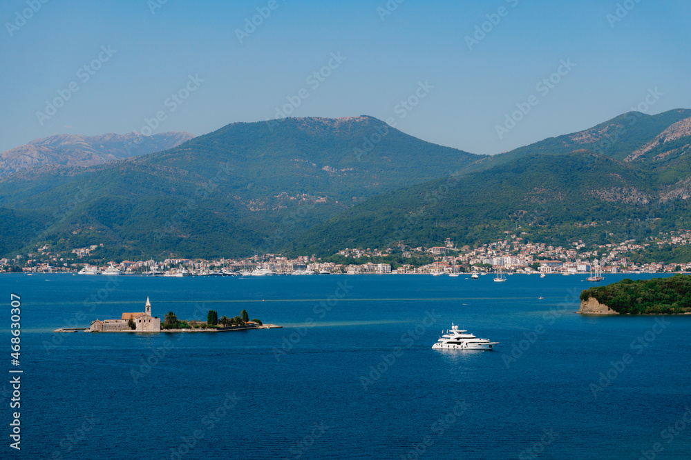 Small island of Otocic Gospa in the bay. Montenegro