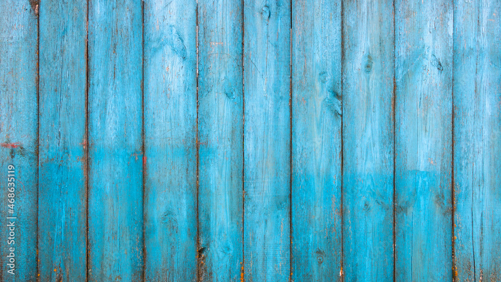 Old blue wooden background with cracks and scratches in vintage style Old blue wooden background with cracks and scratches in vintage style