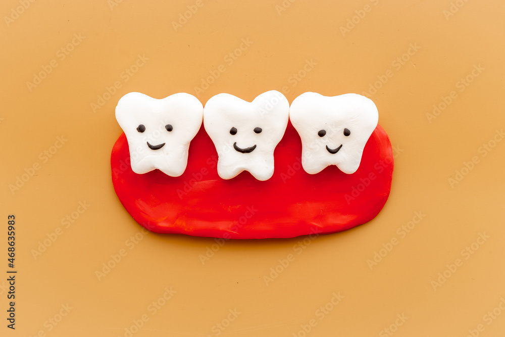 Teeth models with caries or plaque on gums. Oral health concept Teeth models with caries or plaque on gums. Oral health concept